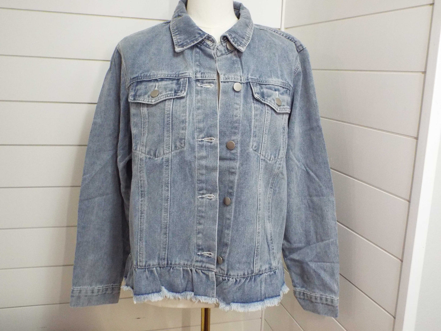 Beau blue denim jacket with ruffle raw hem and flap pockets