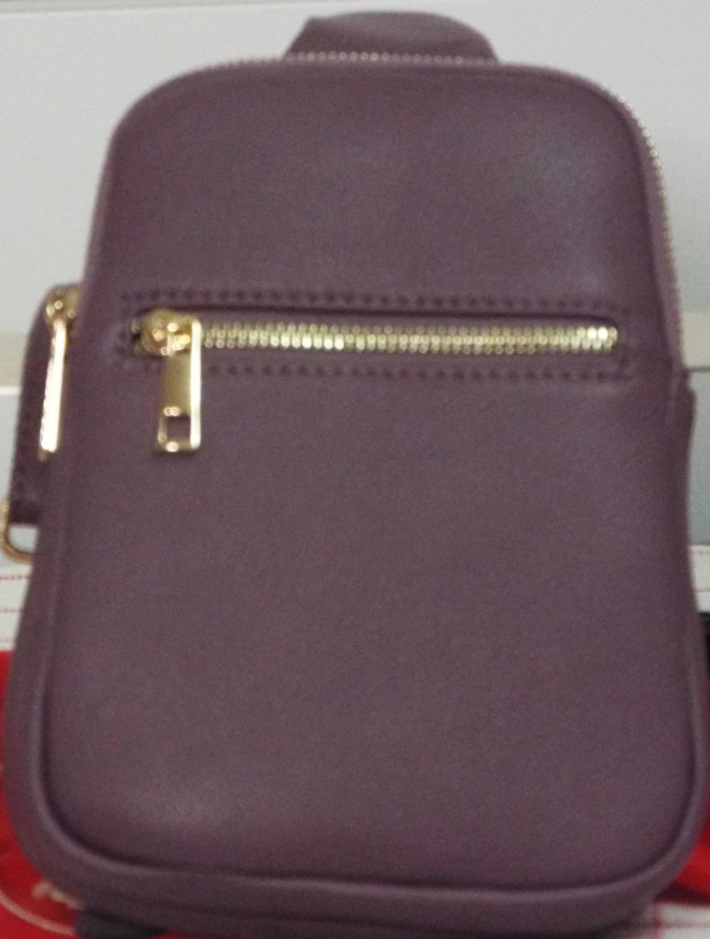 Justine 2 Compartment Sling Bag lightweight and versatile hands-free bag with two compartments for organization