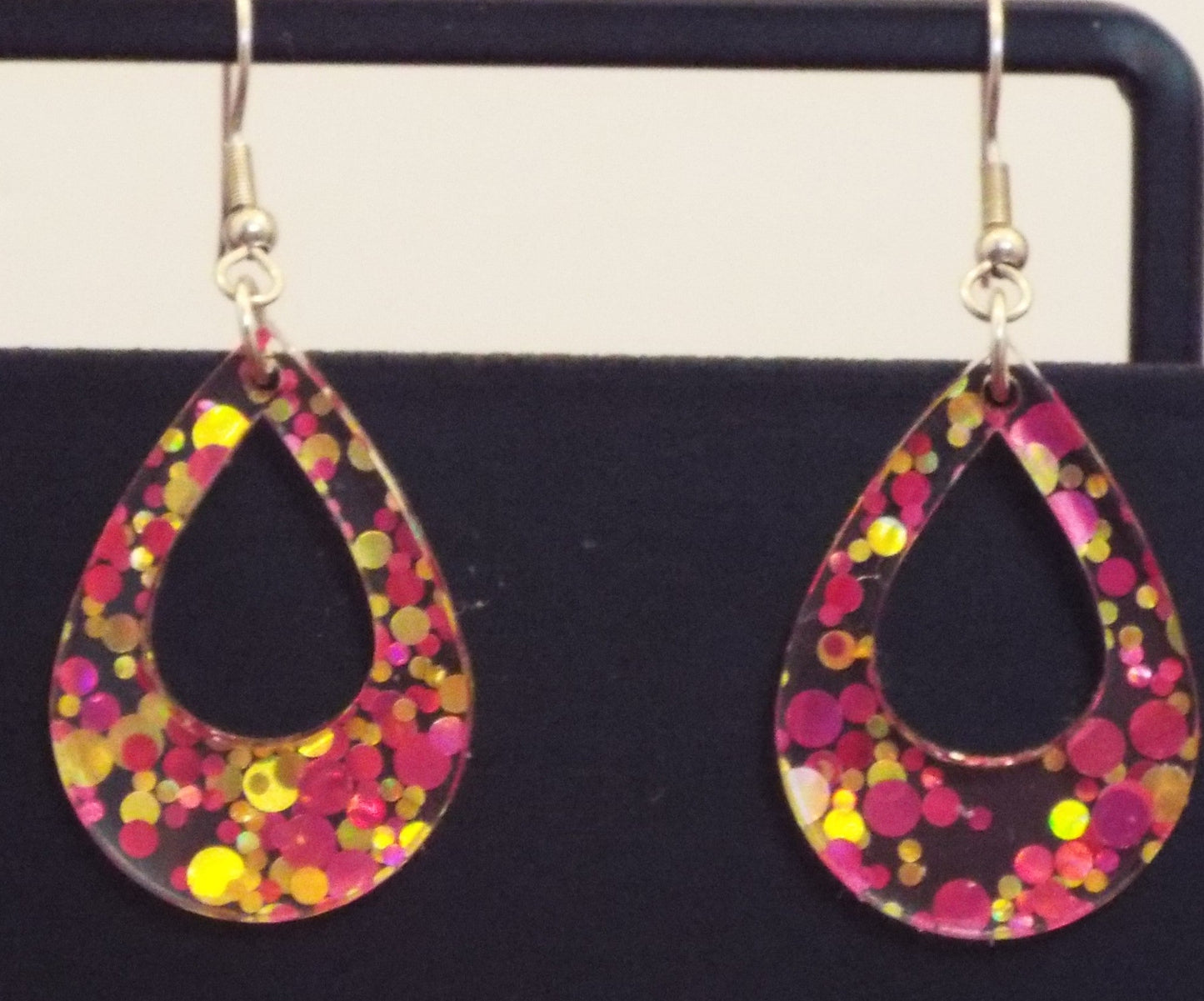 Pink Lemonade glittery drop earrings with teardrop acrylic design and sparkling cutouts