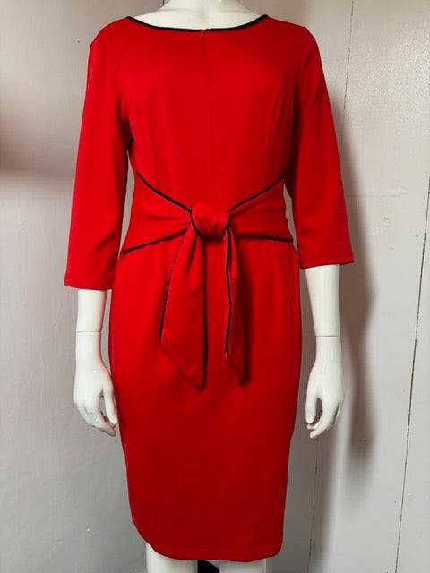 Bold long sleeve dress with flowing sleeves and sleek silhouette for fearless fashion statement