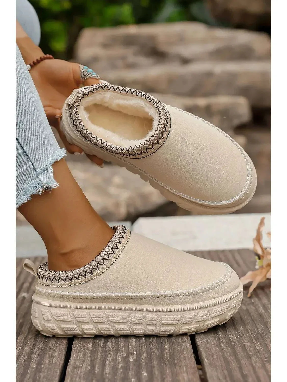 Comfortable suede slippers with warm fur lining and contrast stitch detail