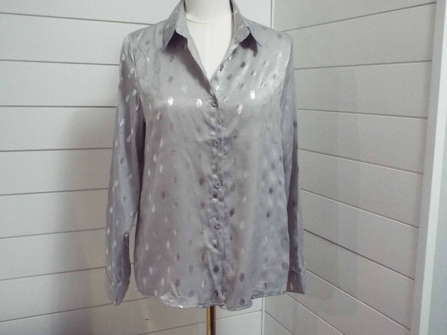 Long sleeve loose bronzing button lapel blouse with relaxed fit and elegant finish