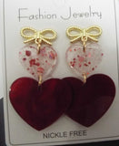 Red Valentine Bow Knot heart-shaped dangle earrings with playful bow detail