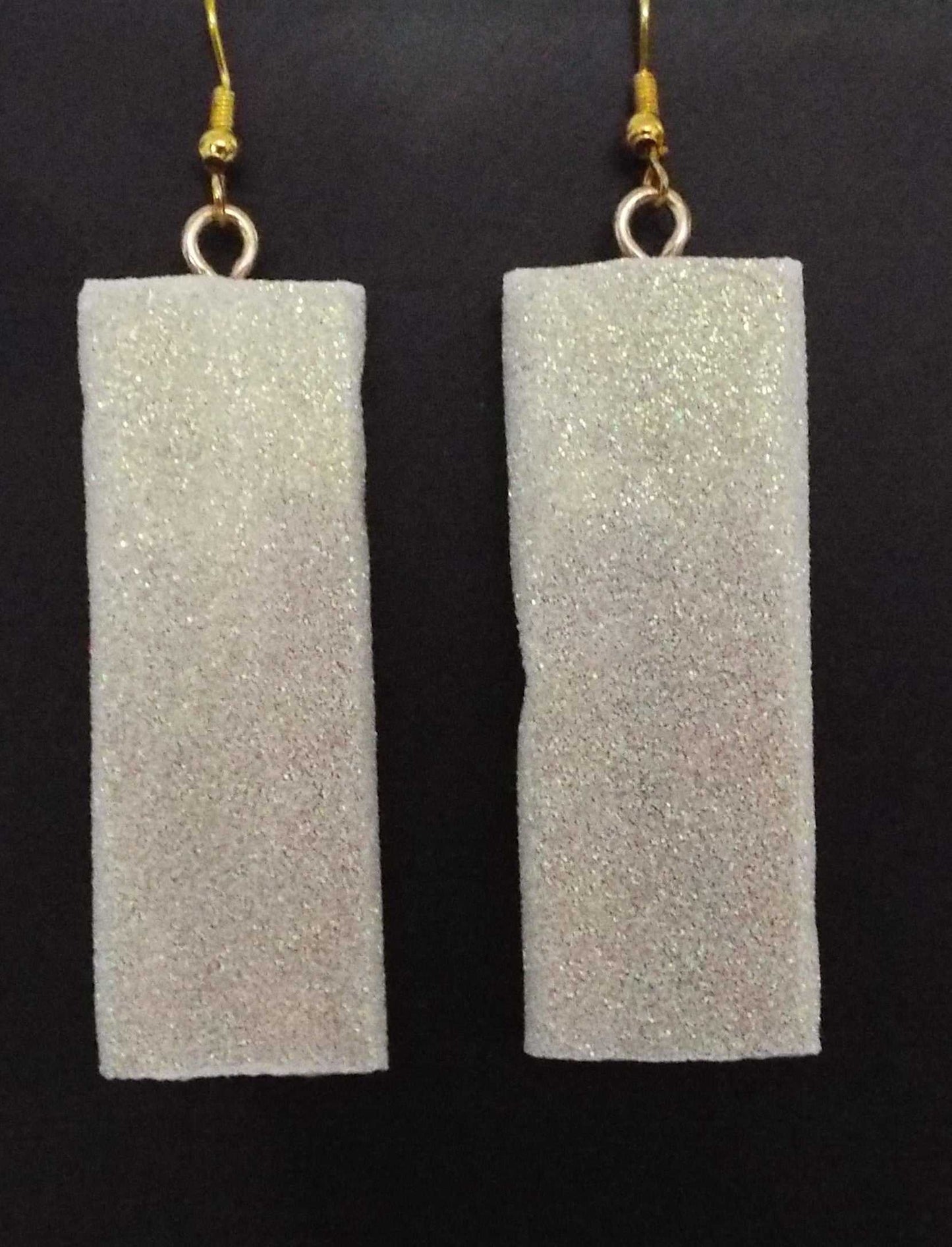 Silver and white glittery rectangle earrings made in USA adding sparkle to outfits