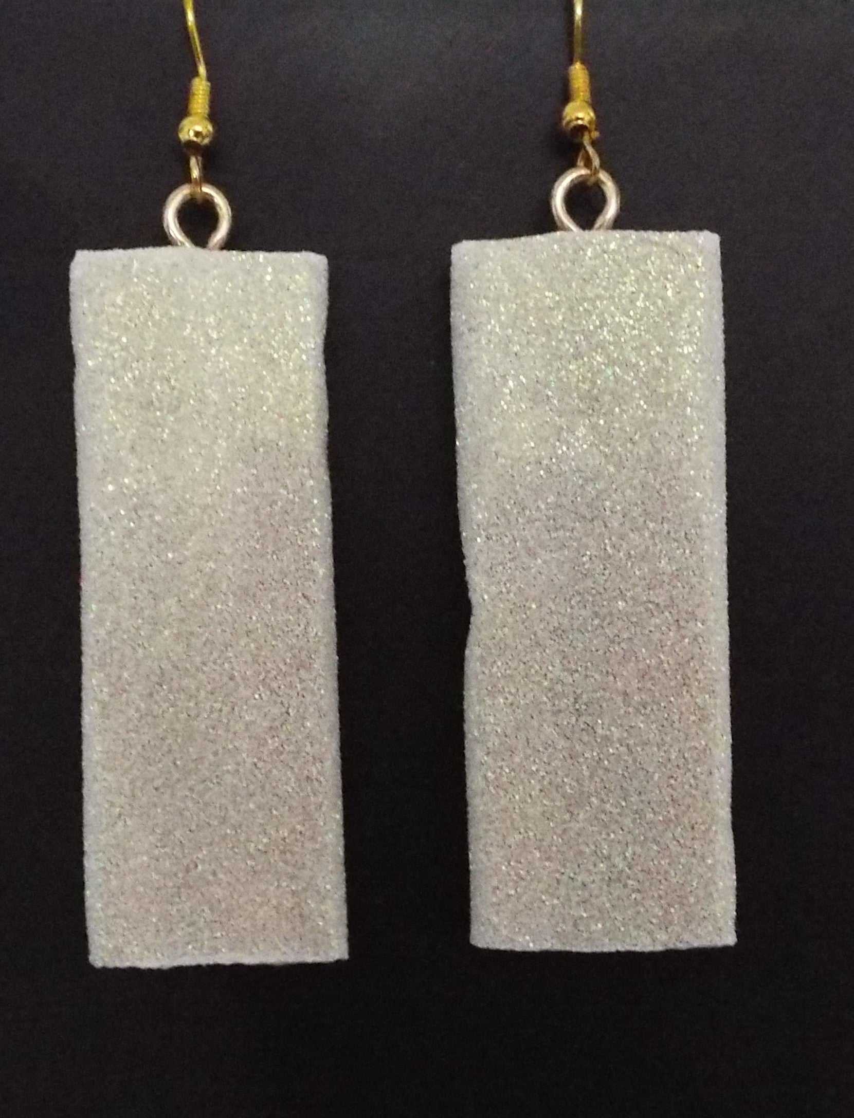 Silver and white glittery rectangle earrings made in USA adding sparkle to outfits