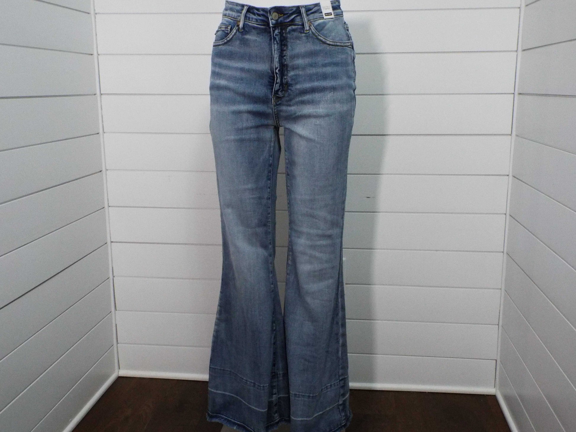 Womens HW Tummy Control medium blue flare pants with built-in tummy support and modern release hem design