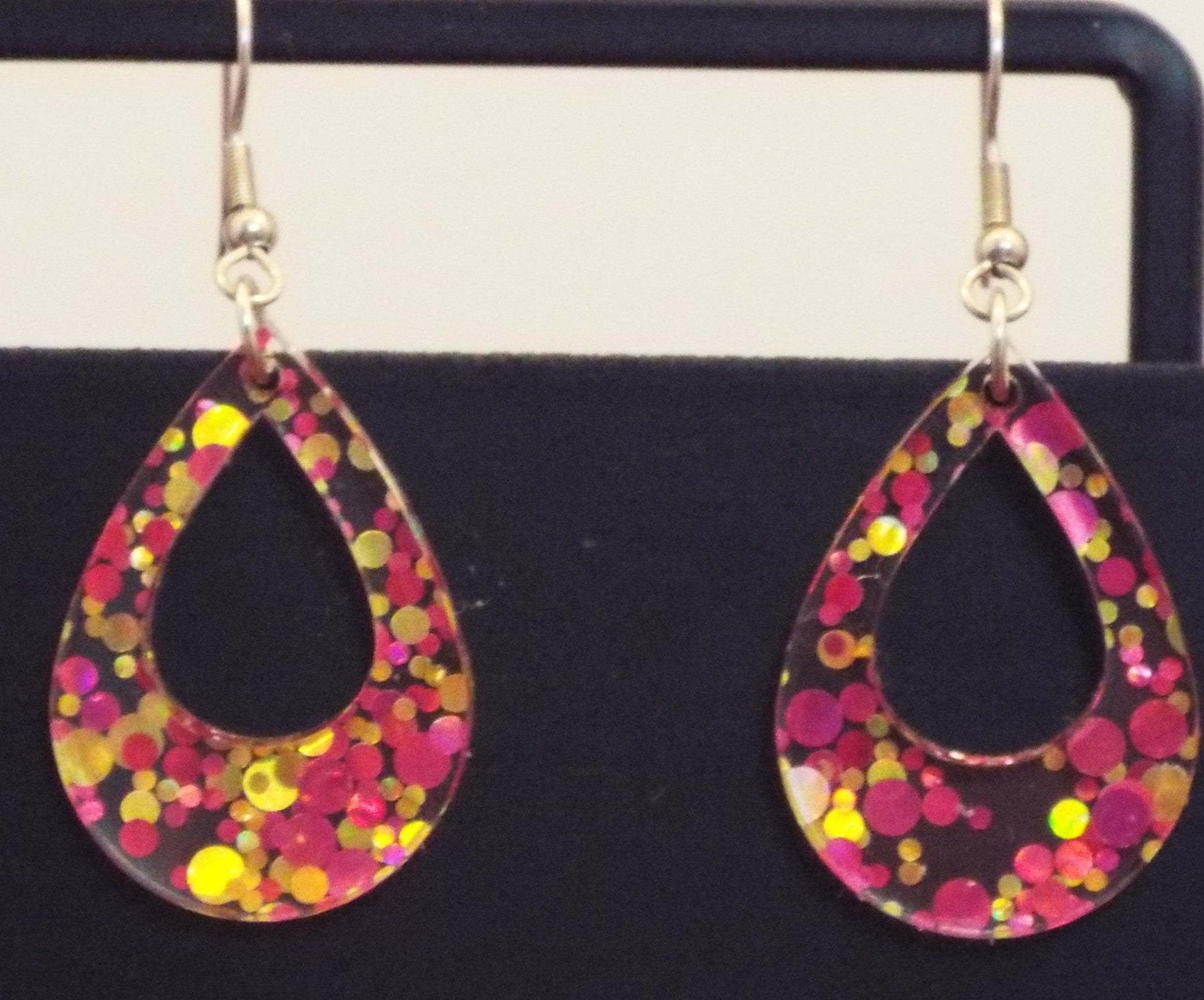 Pink Lemonade glittery drop earrings with teardrop acrylic design and sparkling cutouts