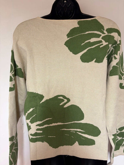 Green floral sweater with vivid botanical print on rich verdant knit fabric