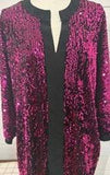 Plus size black and fuchsia sequin blouse with flattering silhouette