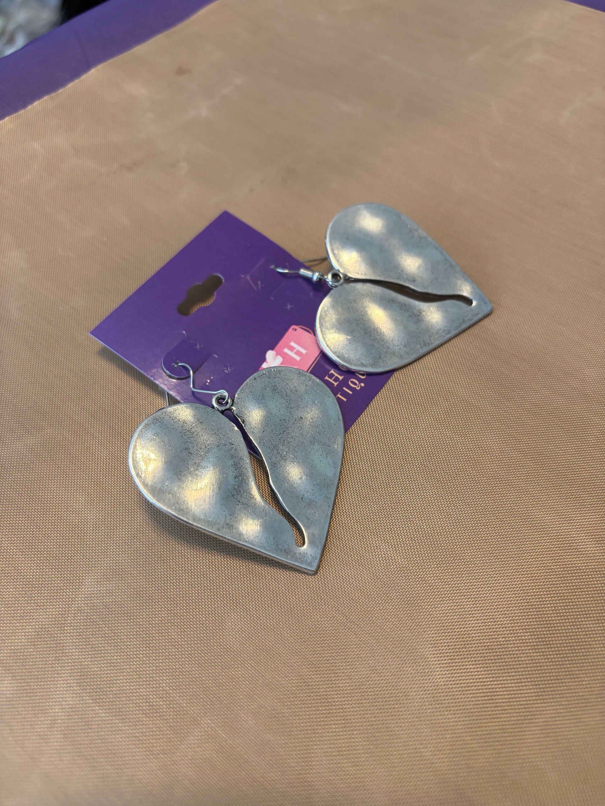 Silver heart earrings made of silver metal
