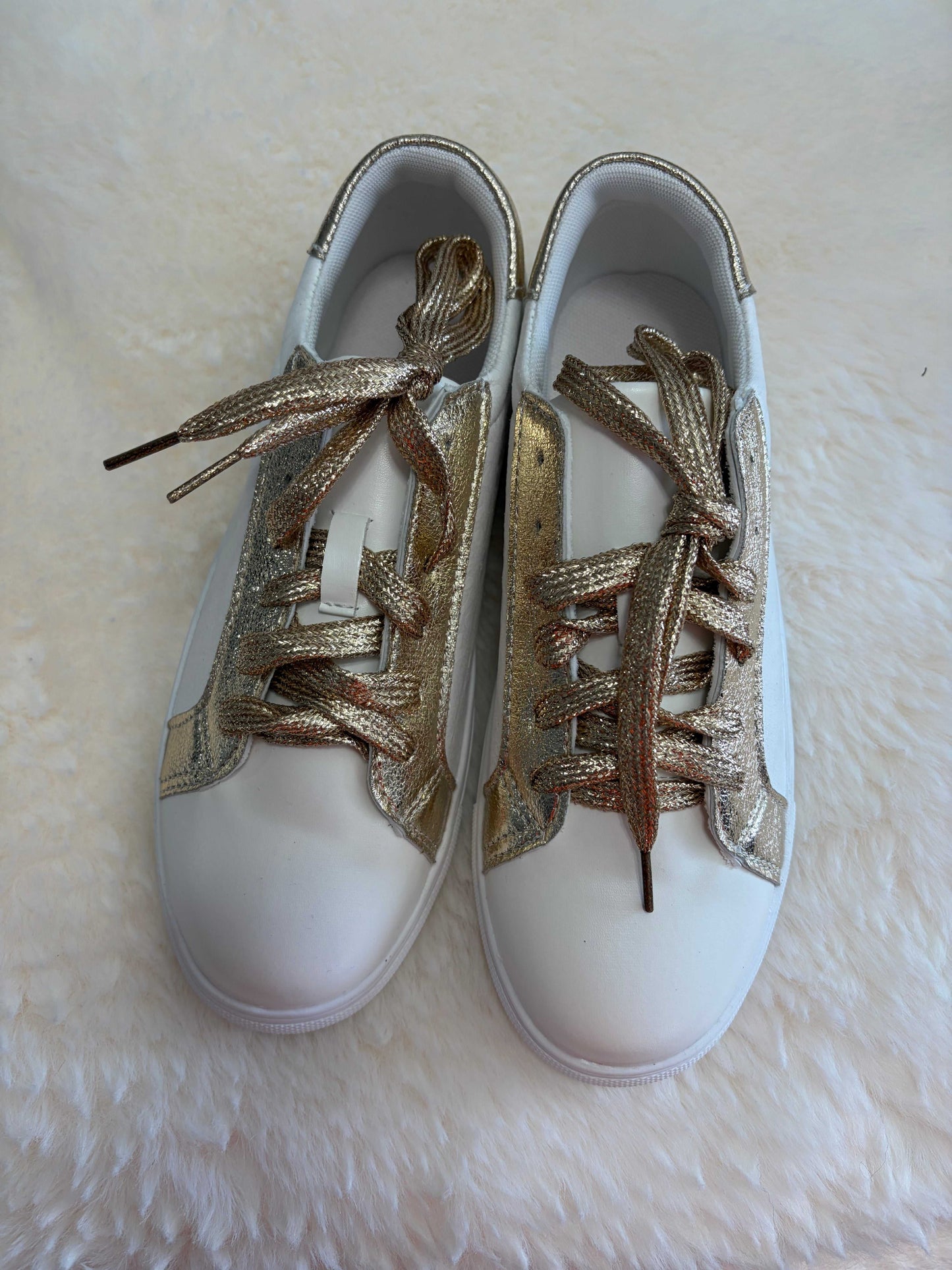 Leopard print ladies sneakers with leather and gold-tone accents