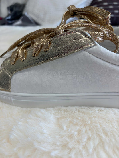 leopard print ladies sneakers with gold-tone accents and leather construction